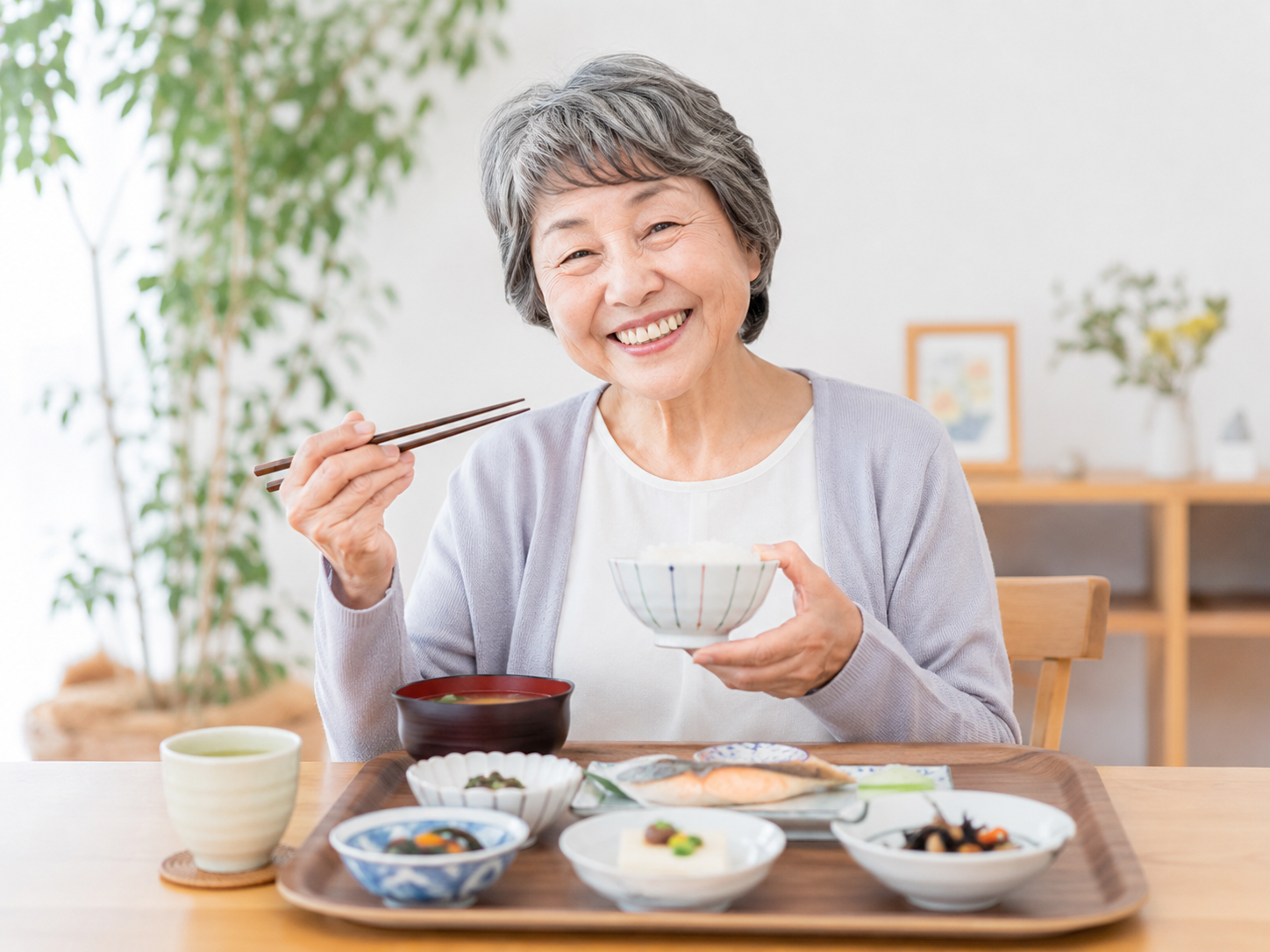 100歳まで元気で明るく健やかに暮らすために食事を楽しむ高齢者
